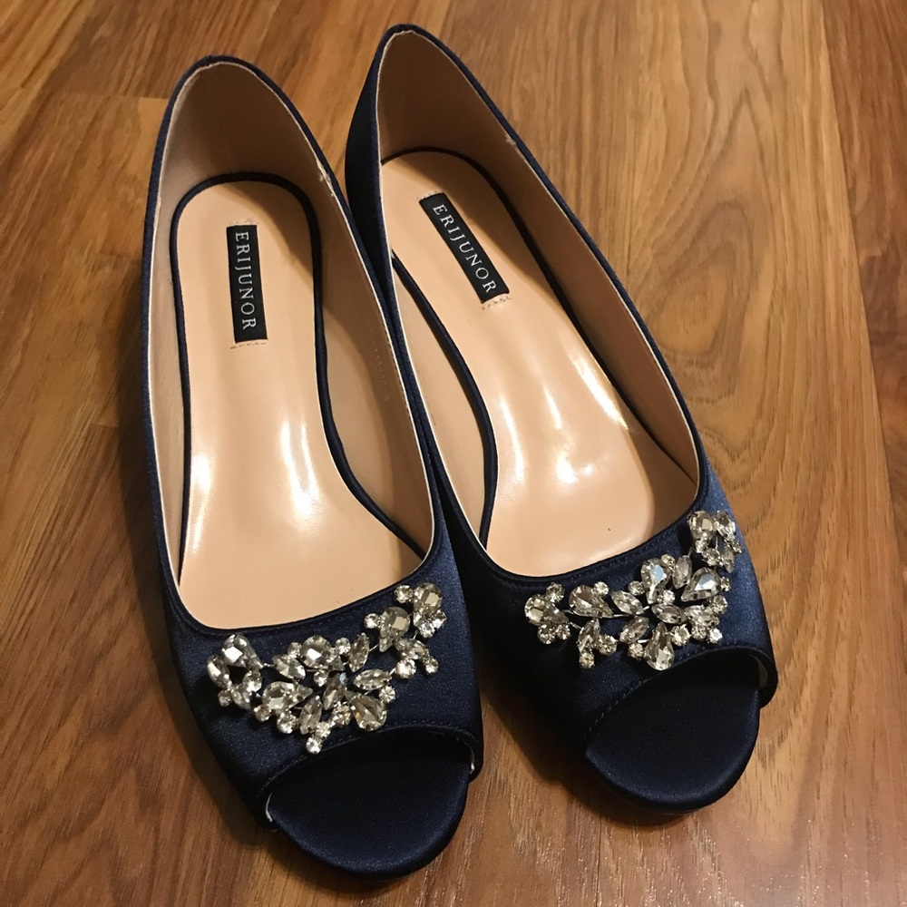 Satin Navy blue kitten heels. Never been worn.